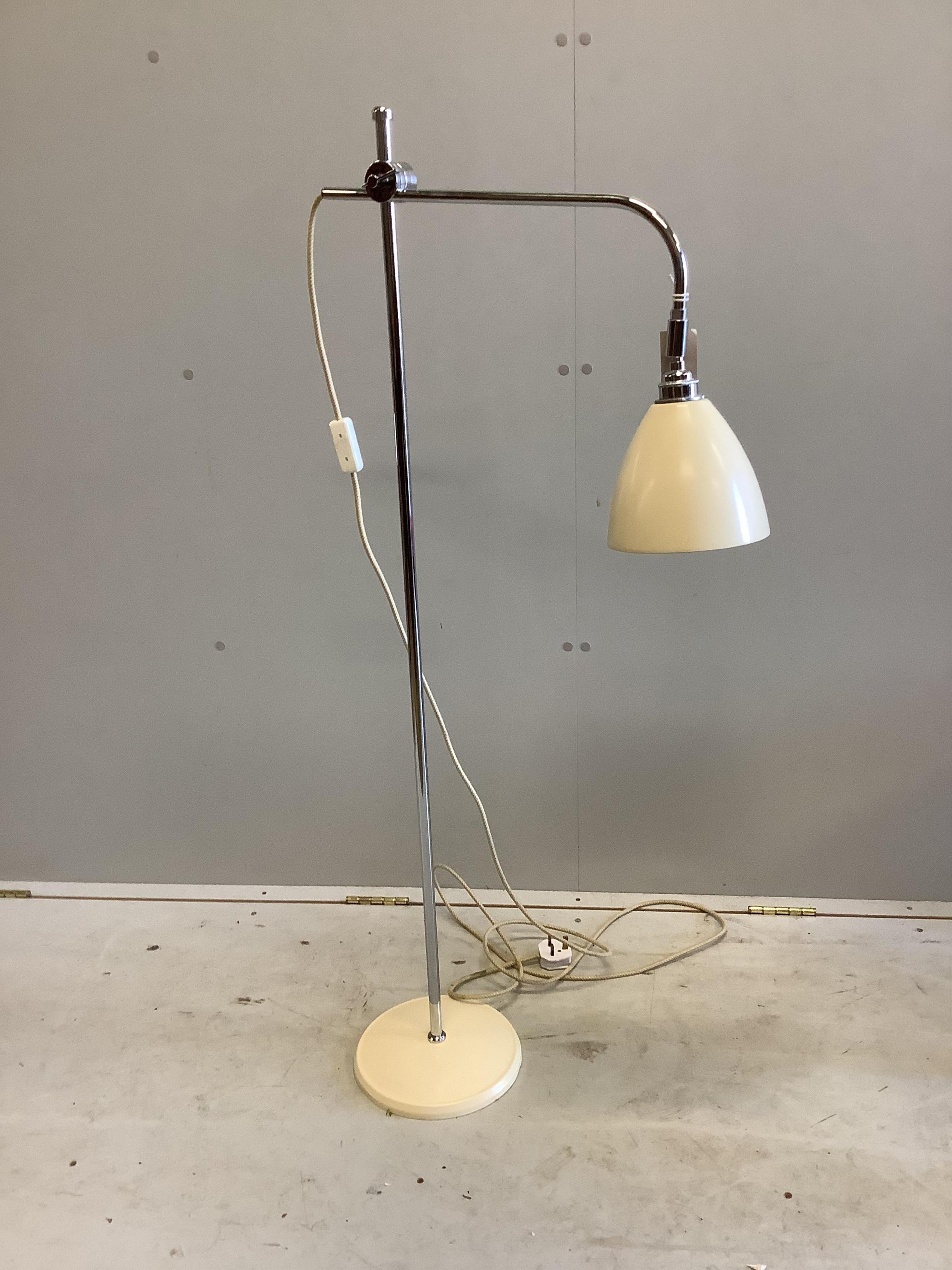 A Contemporary adjustable floor lamp, height 143cm. Condition - good